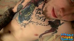 Straight inked thug jacks off his hard dick and sprays cum