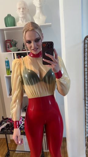 Female in red and yellow latex outfit