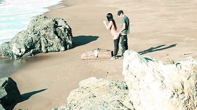 Watching the couple fuck on the beach her pussy gushing wet