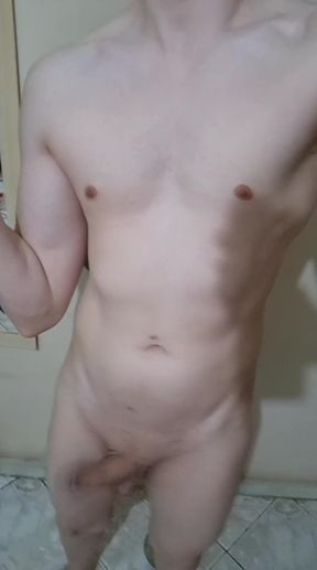 Athletic twunk dances with his cock while jacking off alone