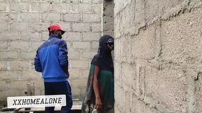 Big-titted Nigerian babe riding in a half-finished structure