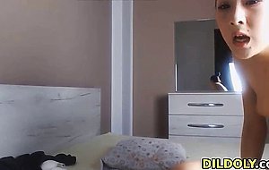 horny asian babe fucking her pussy upside down