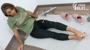 Strong girl workout and her small sexy feet