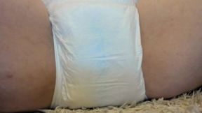 Nicoletta buys some diapers and then fills them with piss and has an orgasm