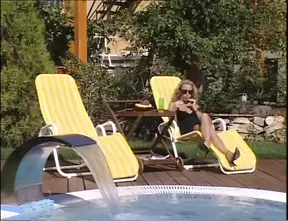 Horny babes lick and suck huge cock in a garden threesome