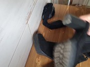 Cumming on her ankle boots