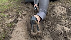 Anastasia got stuck in the mud in her car. The wheels were slipping, and she was trying to get out by pressing the gas pedal, but her stilettos were stuck in the mud, and the engine was roaring with tension