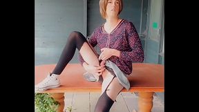 Annemieke playing in front of abandoned restaurant