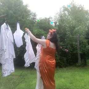 In orange dress with laundry pickup