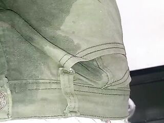 Cloth diaper soiled with pants on