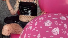 Valeri in boots popping big pink balloons