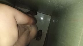 Hairy slim man masturbates in the shower at home