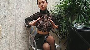 Topless Busty Asian Enjoys Her Cigarette Outdoors