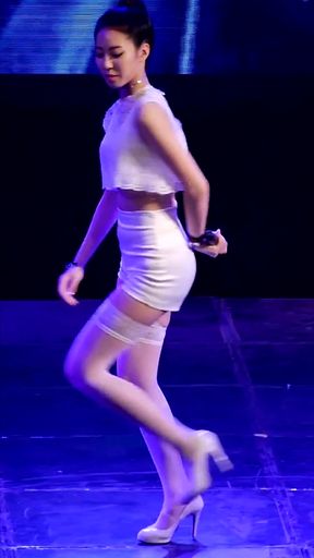 Slim K-pop fan jiggles her thick thighs while standing alone