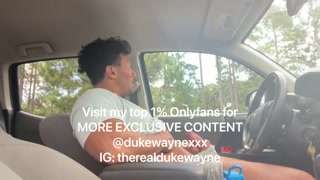 Cumming in a parking lot