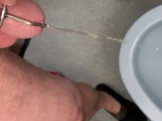 Pissing through a urethra plug - stimulate the flow through penis