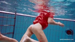 ”Red long dress & big boobs floating in the pool”