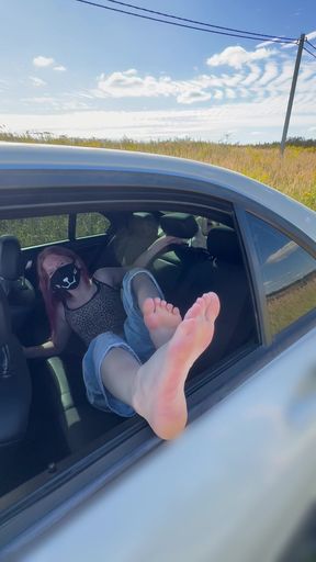 Spanking in the Car on the Heels and Butt