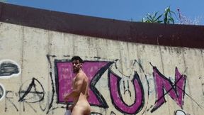 Naked at daylight next to railway