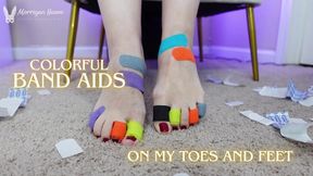 Colorful Band Aids on My Toes and Feet