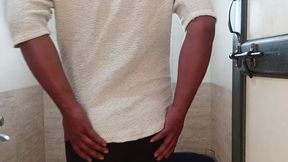 Indian boy wearing bra and panties in batharoom.