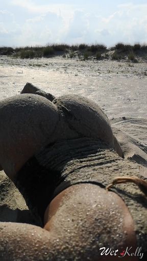 Hot babe teasing on the beach