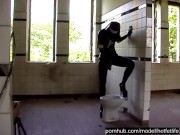 Black Latex Rubber Church Nun With High Heels Pisses Outdoor And Peeing In Pee Bag