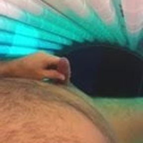 jacking off in tanning bed