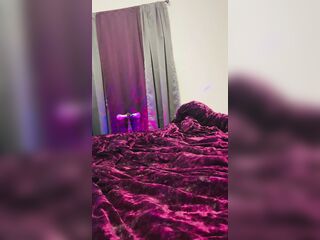Ebony bangs dildo while watching YouTube