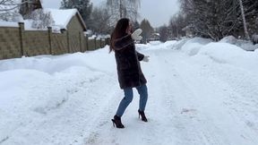 High heels mules on ice, girl on high heels on ice, sandals on ice, slippery high heels mules