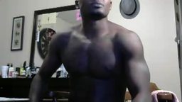 Muscle Black Guy Stroking Dick