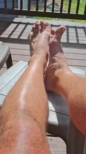 My pedicured feet and hairy legs 2