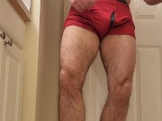 Hairy muscle bear flexing in red boxer briefs