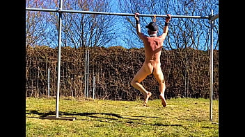 naked pathetic slave outdoor in penis cage swings at his testicles in front the guests