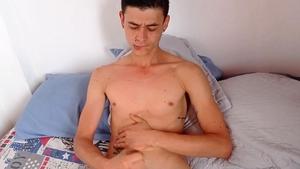 BarebackLatinoz - Young latino Dominic striptease in the bed