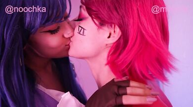 Handcuffed esbians rough each other up in a prison cell and kiss with tongue