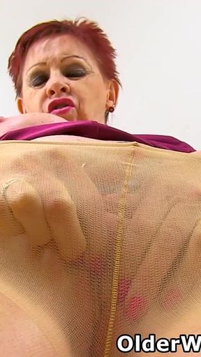 Naughty GILF Sensual Caroline Stuffs Her Old Pussy with Nylon Tights