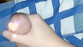 Big cock squirting under the covers makes a year old cum