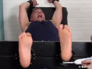 Older dude Brendan Cage is bound to the table and tickled