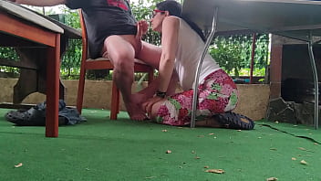 Horny woman sucks big cock under the table