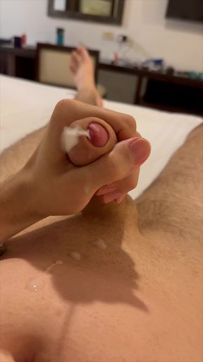 Twink jerks his hot cock, moans and cums on his tummy