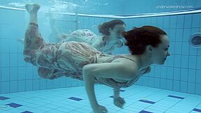 Two Dressed Beauties Underwater Netrebko And Poleshuk