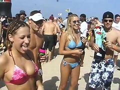 Tanked sluts flash their tits for a chance to get some beads