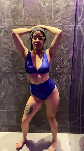 Arab doing striptease in a hotel restroom