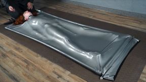 Grey vacuum bed with vibro and penis gag