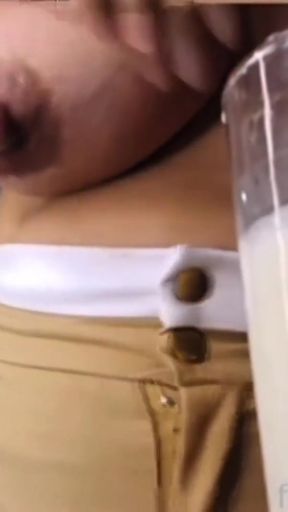 Woman milks herself and drinks her breast milk   Clip 2