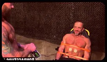 Dominant Bald Muscle Man Commands Bound Sub in Intense BDSM Play