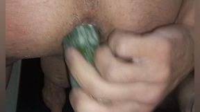 one handsome man and one cucumber