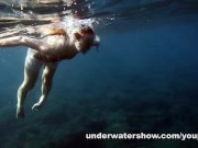 Nastya swimming nude in the sea