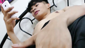 Skinny Asian twink on the phone feet teases & masturbates